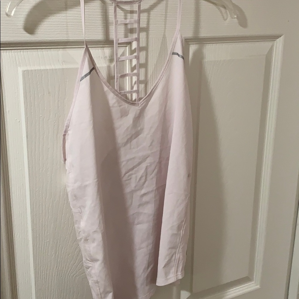 Light pink Lululemon workout tank